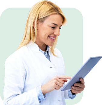 healthcare professional using a tablet to review patient data on our cloud based pain management software